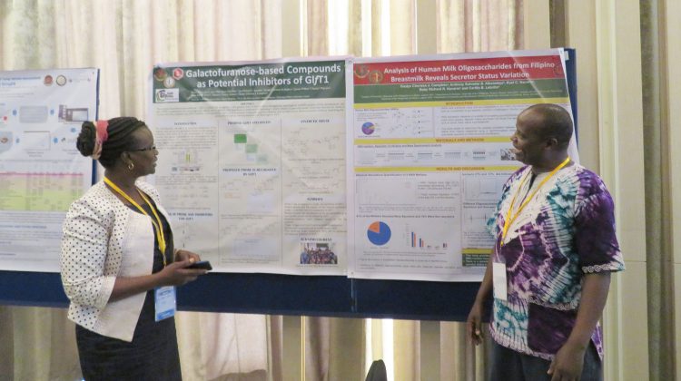 DR. JOSEPH “KIP” RUGUTT, right, associate professor of chemistry at Missouri State University-West Plains, joins Professor Joyce Kiplimo, his colleague from the University of Kabianga in Kenya, in presenting information about the collaborative research project at the Asia International Chemistry Conference in Singapore in September. (Photo provided)